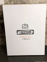 Front of sealed box showing title and edition