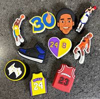 Front view of all ten basketball charms