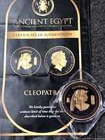 Coin with certificate of authenticity and Ancient Egypt packaging