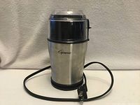 Front view Capresso stainless electric grinder with cord