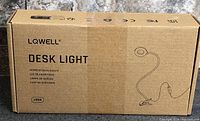 Front of sealed LQWELL desk light box showing model and branding