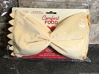 Front view of packaged Fred Comfort Food hot & cold eye mask
