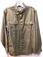 Front view of olive green Goodthreads button-up shirt