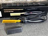 Hair straightener with box showing model and plug type