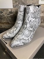 Boots angled side view on box