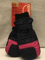 Front view showing navy and pink design with Kombi branding and hang tag