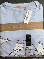 Folded pajama set with tags and ribbon