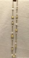 Full view of long Lia Sophia necklace showing bead pattern and length