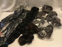 All ten hair extension bundles in packaging