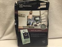 Front of dented Electrolux Anti-Allergy EL202G box showing product image and branding