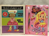 Front covers of both activity books side by side