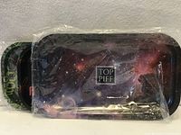 Front view of three trays nested, galaxy print visible