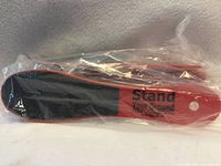 Sealed foot file showing full abrasive surface and branding