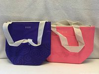 Front view of both lunch bags showing colors and brand