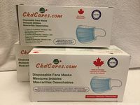 Front view of three CkdCares mask boxes showing brand, Level 3, made in Canada, 50 masks per box
