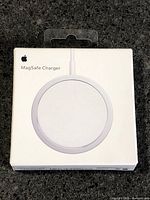 Front of sealed Apple MagSafe Charger box