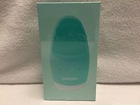 Front of sealed Meejee box showing product image and color