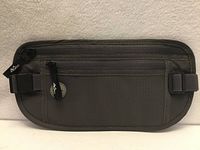 Front view showing overall condition, dual zip pockets, MoKo branding