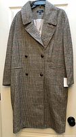 Front view of plaid long jacket on hanger