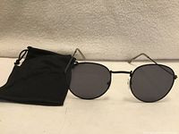 Front view of sunglasses with pouch