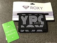 Wallet on original cardboard backing with hang tag