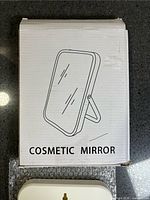 Mirror box showing line art image and label