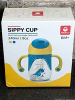 Front of retail box showing hahaland spill-proof sippy cup