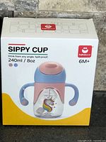 Front of sealed retail box showing product image and branding