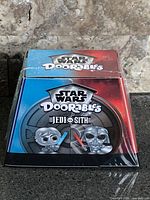 Front view of sealed Disney Doorables Star Wars Jedi vs Sith 2-pack