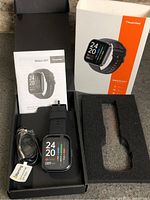 Truefree Watch GT1 smartwatch, box, manual, cable and foam insert