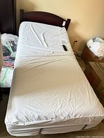 Bed base with white mattress