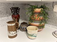 Group shot of all five ceramic pieces on countertop
