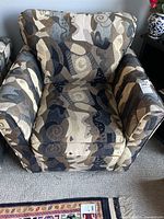 Front view of Couch Potato swivel armchair