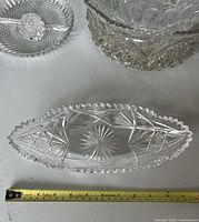 Oval relish dish, small dish, large bowl with tape for scale