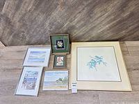 All six framed prints laid out for size and style reference