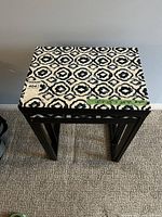 Larger table top showing pattern, dimensions tape, lot sticker