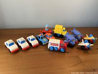 Group shot of all vehicles and figure