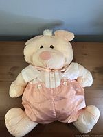 Full view of Puffalump bear lying flat