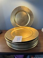 Stack of chargers with one displayed upright