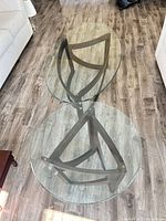 Top view of both glass tables showing bases