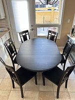 Dining table with six chairs viewed from above