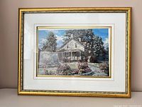 Front view showing entire framed print with mat and gold frame