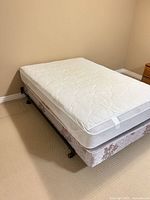 Full view of mattress set on frame