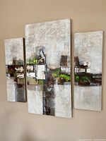 Frontal view of all three canvases hung together