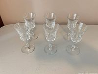 Six clear crystal cordial glasses front view
