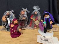 Group shot of all five Annalee dolls, showing their size and packaging