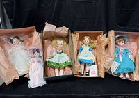 Group of five Madame Alexander dolls in boxes