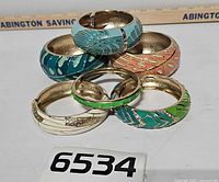 Six enamel clamper bracelets, colour and pattern variety