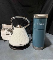 Keurig K-Mini Plus coffee maker and J Jason Wu electric kettle side by side