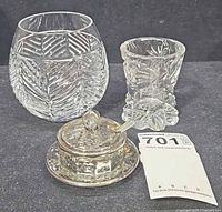 Three main items: Ralph Lauren roly-poly glass, Waterford cordial, silver overlay condiment set